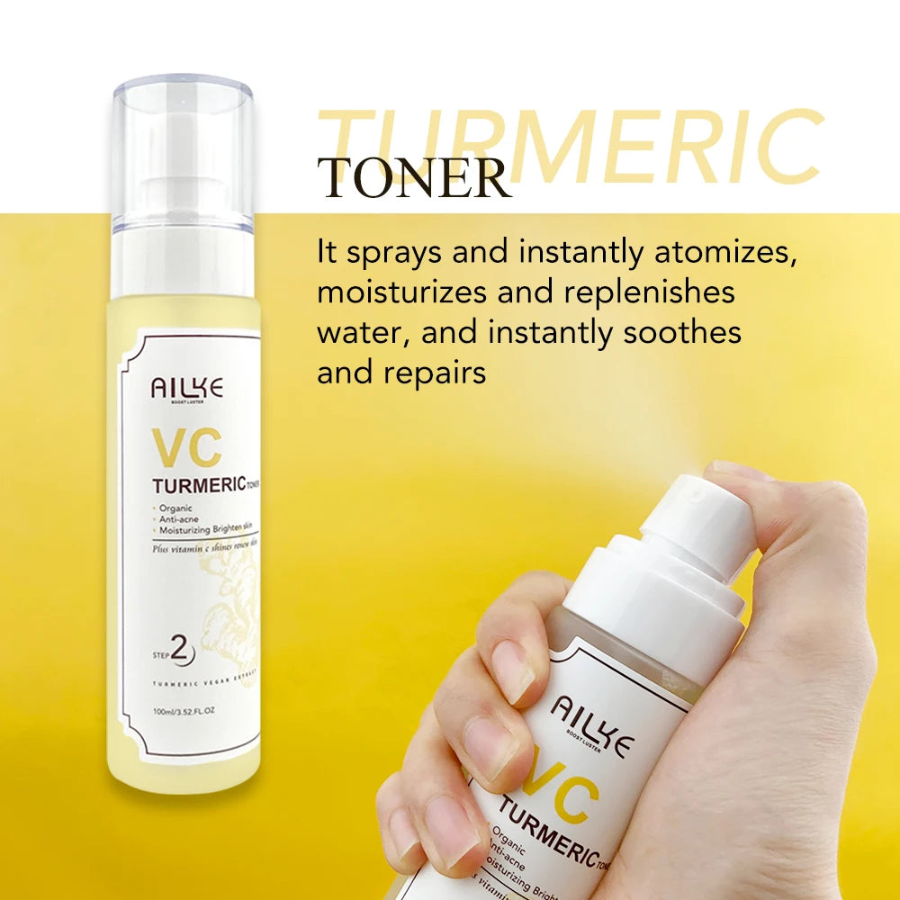 Ailke VC Turmeric toner bottle with a hand holding another bottle against a yellow background