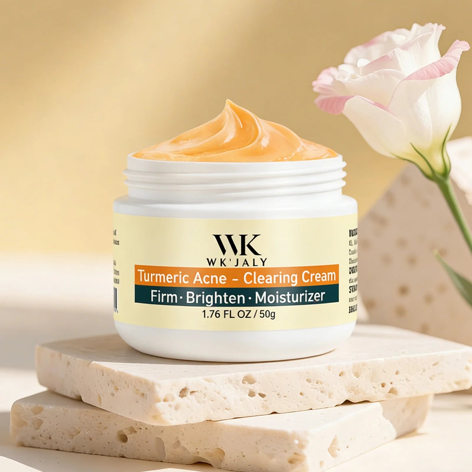 Jar of WK JALY Turmeric Acne-Clearing Cream with a rose in the background