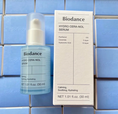 Biodance Hydro Cera-Nol Serum bottle and packaging on a tiled background
