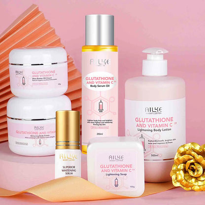 Set of Allye skincare products on a pink background with decorative elements.